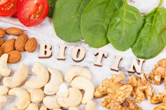 What is biotin and what is its role in hair growth?