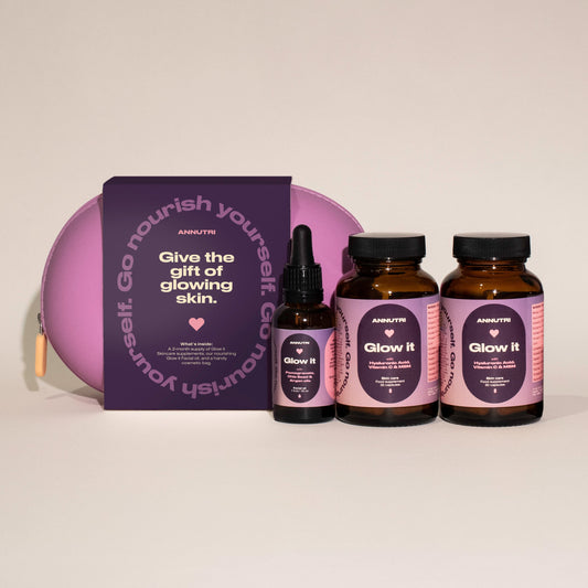 Skincare product set with bottles and packaging on a light background